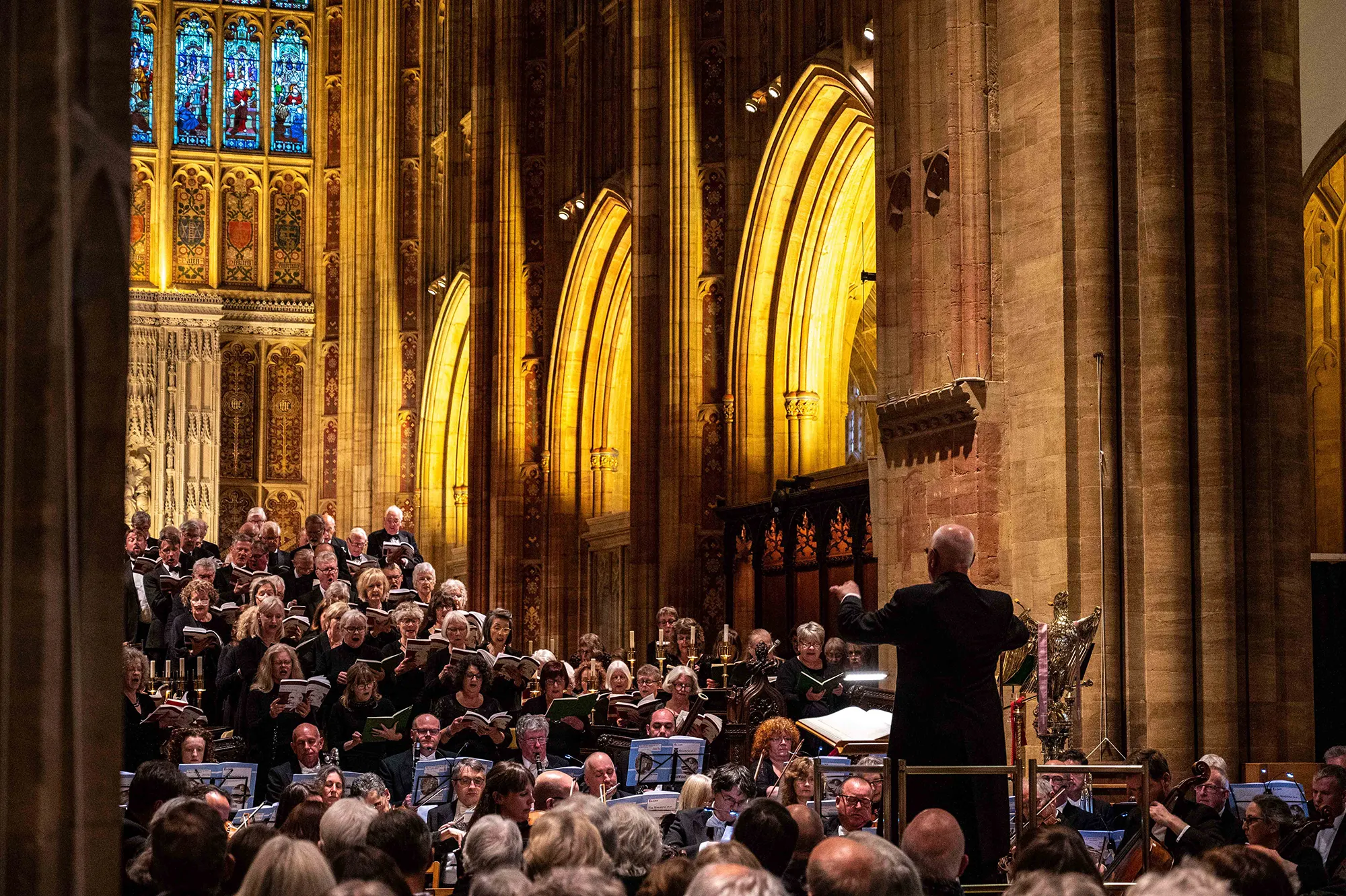 Sherborne Festival Chorus performing in Sherborne Abbey, viewed from the north aisle