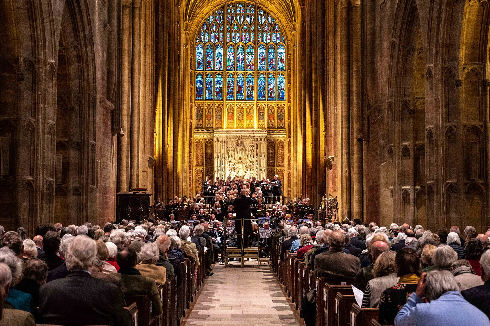 Sherborne Festival Chorus performing in Sherborne Abbey, viewed from the west end of the nave